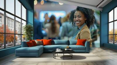 Close-up photo portrays the animated reactions of a group of businesswoman and participants as they laugh and listen attentively to startup business owner at trade show exhibition event. Wall mural