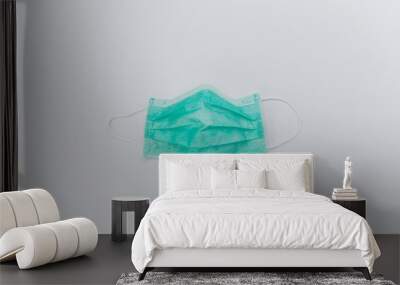 isolated Hygienic Mask (green color) in studio light on white background. Wall mural