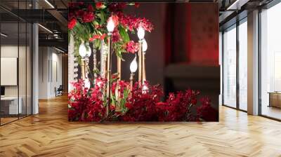 LED light in the gold candle, decored in the wedding event with red orchid around. Wall mural