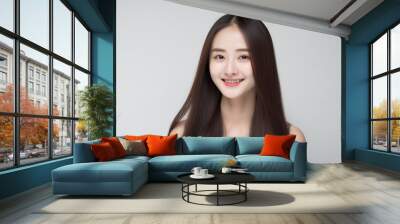 Long Hair Japanese Girl Teenager smiles at the Camera on White Background with studio light. generative AI Wall mural