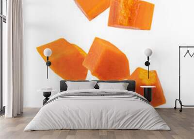 Falling papaya sliced isolated on white background Wall mural