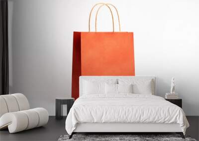 Orange shopping bag isolated on white background. Wall mural