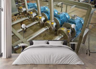 Stainless steel pumps and motors which are commonly used in the food and beverage industry. Wall mural