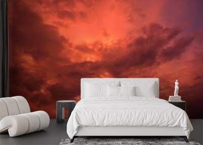 Evening sky and amazing red clouds. Wall mural