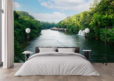 Rafts at the Kwai Noi river and Sai Yok Yai waterfalls in Sai Yok national park view in Kanchanaburi Province,Thailand Wall mural