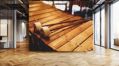 Xylophone throw sticks placed on the xylophone, Thai musical instruments in the music classroom. Wall mural