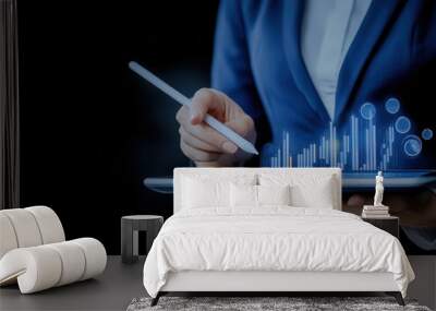 Businesswoman Analyzing Data on Tablet with Stylus Pen Wall mural