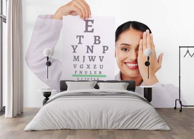 Portrait, test and eye chart of woman, optometrist and isolated on transparent png background. Face, smile and ophthalmologist with snellen exam for medical vision, text or eyesight health of doctor Wall mural