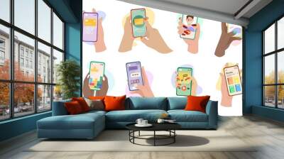 Hands holding phones with mobile apps vector illustrations set. Female cartoon social media users chatting, writing posts online isolated on white background. Technology, communication concept Wall mural