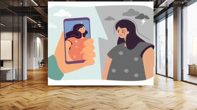 Sad girl looking at happy girl on photo vector illustration. Cartoon drawing of upset woman with low self-esteem looking at phone screen in big hand. Beauty standards, social media concept Wall mural