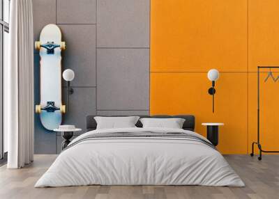 Skateboard on a textured surface with vibrant colors, minimalist design. Wall mural