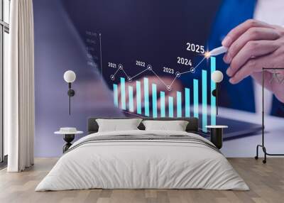 2024 to 2025 business financial plan market concept, performance of profit growth on 2024, education trend up finance on growth graph money revenue, Businessman analyzes profitability of working. Wall mural