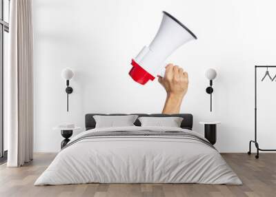 male hand holding a megaphone on a white background with clipping path Wall mural