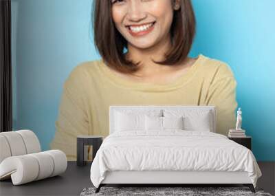 portrait young woman asian on Blue background Wall mural