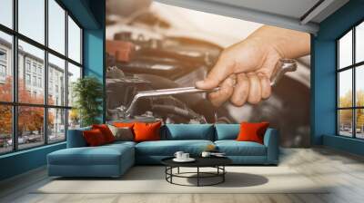 Fixing automotive engine, car service and maintenance, Repair service, repairman hands repairing a car engine automotive workshop with a wrench, Auto service, maintenance concept, Fix car. Wall mural