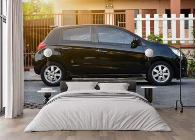 Car parked on road,Car on street Wall mural