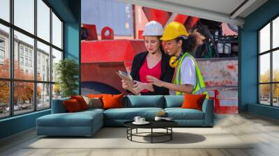 Team worker American women Work in an international shipping yard area Export and import delivery service with containers Wall mural