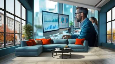 Analyst Reviewing Financial Data on Screens Wall mural