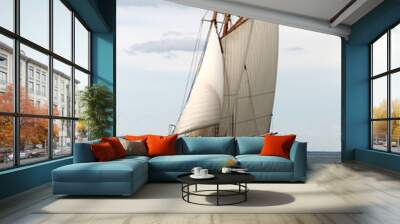 a schooner sailing on a bay Wall mural