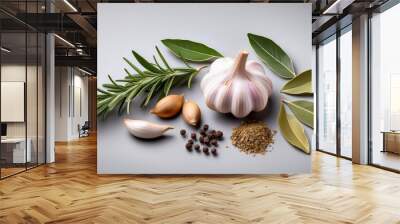 assorted spices bay leaf rosemary savory and garlic cloves arranged in a still life composition Wall mural