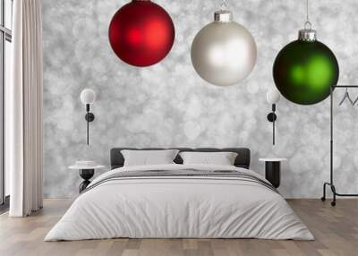 White, Red and Green Christmas Ornaments On Silver Bokeh Backgro Wall mural