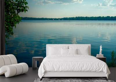 Scenic Lake Harriet in Minneapolis, Minnesota on a sunny summer afternoon with ripples of waves of water flowing slowly across the lake Wall mural