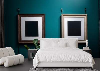 two matching frames with sleek wooden borders on a vibrant teal gallery wall Wall mural