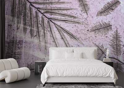 Background in pinks and geenish grey of tropical foliage embedded in grainy concrete to look like fossils for background Wall mural