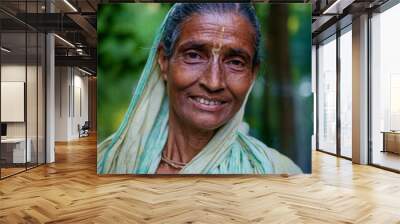 Portrait of south asian hindu religious poor elderly woman in traditional dress in outdoor  Wall mural