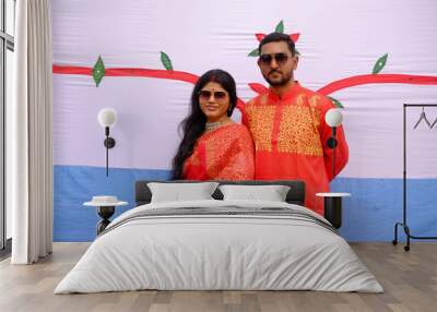 South asian young couple in traditional red costumes, festival costumes concept  Wall mural