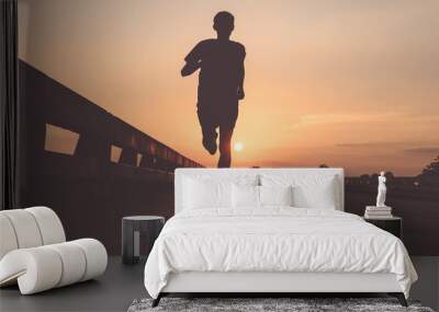 Athlete runner feet running on road, Jogging at outdoors. Man running for exercise.Sports and healthy lifestyle concept. Wall mural