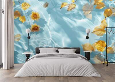 Water background. Blue aqua texture, surface of ripples, transparent, flower, shadows and yellow leaves. Spa and cosmetic concept background. Flat lay, top view, copy space, banner Wall mural