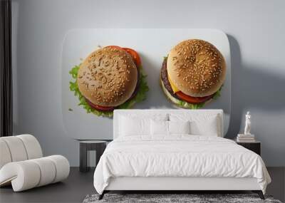 Two hamburgers with lettuce and tomato on a white plate Wall mural