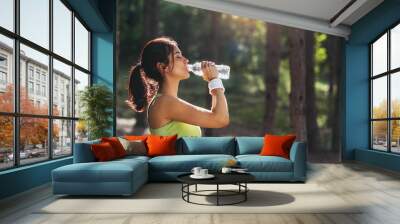 Girl drinking water Wall mural