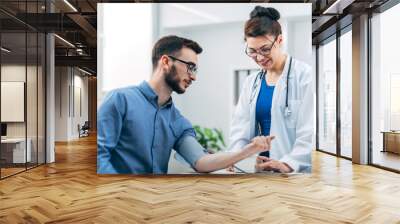 Patient getting a Blood Pressure Check Up at the Hospital Wall mural