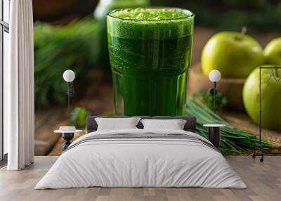 Fresh wheatgrass and apple juice combo served in a tall glass, the vivid green and golden yellow liquids swirling together. The glass is set on a wooden table with a backdrop of fresh wheatgrass  Wall mural