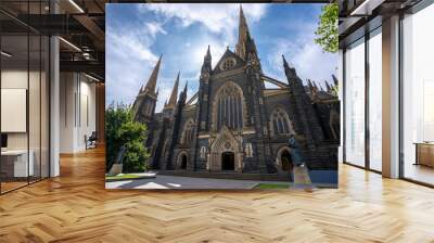 St Patrick's Cathedral. Spire a Roman Catholic Cathedral church with blue sky at Eastern hill in Melbourne, Victoria, Australia Wall mural