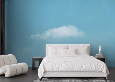 beautiful blue sky and white fluffy single cloud with sunrise in the morning, natural background Wall mural