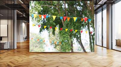 colorful triangular flags of decorated celebrate outdoor party Wall mural