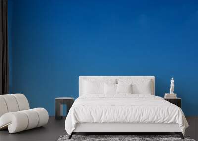 fluffy white cloud above clear blue sky background Wall mural