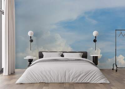 fluffy white cloud above clear blue sky background Wall mural