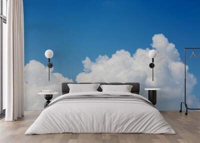 fluffy white cloud above clear blue sky background Wall mural