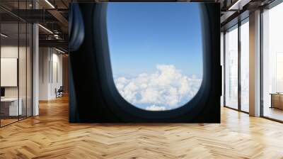 Scenery outside the window of a passenger plane, beautiful blue sky and white cloud view Wall mural