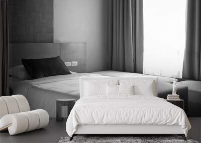 Well bed in bedroom. Sunlight through pass. Black and white color tone.  Wall mural