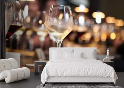 white wine on hand with dinner on restaurant Wall mural