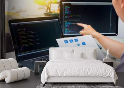 Developing programming and coding technologies on desk white, Website design, Programmer working in a software develop company office,Data processing center. Wall mural