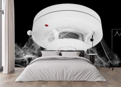 smoke and fire detector with smoke  isolated on black Wall mural