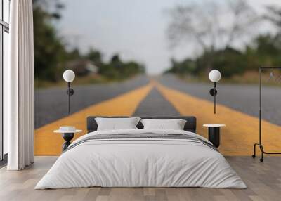 asphalt road with lines and sky Wall mural