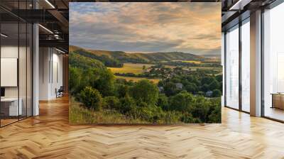 Beautiful views west over the village of Poynings from Devils Dyke to Chanctonbury ring on the south downs in west Sussex south east England UK Wall mural