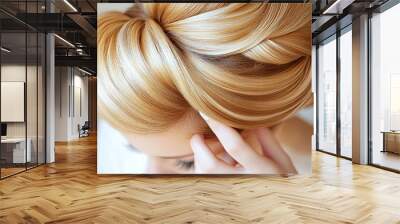 Close-up of professional hairdresser creating elegant French twist hairstyle. Detailed shot of hands styling hair for a sophisticated and formal look Wall mural